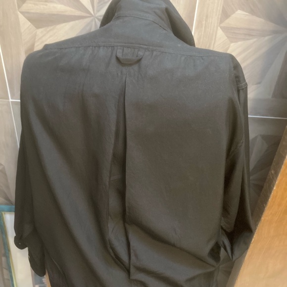 Black silk jacket pockets, abalone buttons, zipper and pleat in back. - Picture 2 of 5